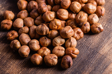 Raw, unshelled hazelnuts close-up. Hazelnut
