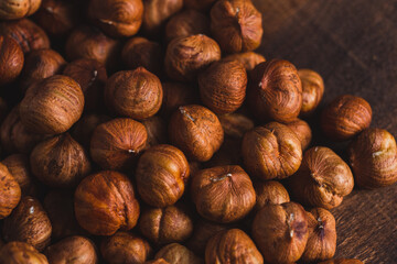 Raw, unshelled hazelnuts close-up. Hazelnut