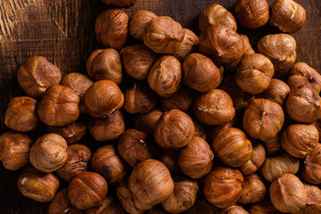 Raw, unshelled hazelnuts close-up. Hazelnut
