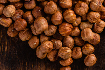 Raw, unshelled hazelnuts close-up. Hazelnut