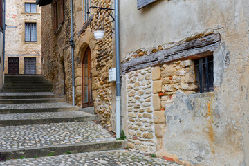 ST-ANTOINE-L'ABBAYE, FRANCE, November 5, 2024 : Small streets of the medieval village surrounding the Abbey of Saint-Antoine.