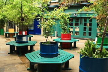Colorful Planters and Benches in Neal’s Yard, London, UK – Vibrant Courtyard with Lush Greenery and Urban Charm