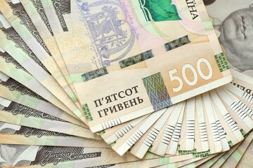 Big amount of different ukrainian hryvnia currency money bills in pile