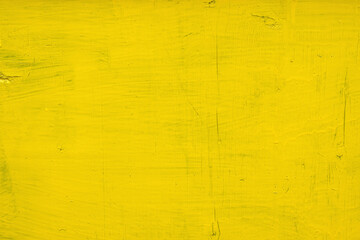 Abstract background, wooden surface painted with yellow paint