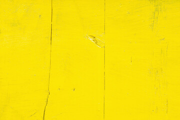 Abstract background, wooden surface painted with yellow paint