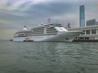 Ultra luxury cruiseship cruise ship liner yacht Whisper or Shadow docked in Victoria Harbor with...