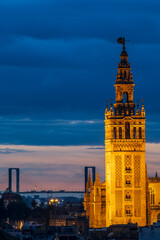 Fototapeta premium Giralda Tower and Centenary Bridge in Seville Aerial View