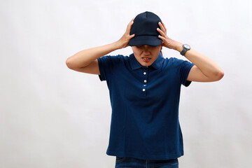 Young hispanic woman courier wearing delivery uniform and cap with hand on head for pain in head because stress. suffering migraine.