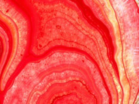 Close-up of red background with vibrant hues, evoking feelings of hunger and appetite, craving, red