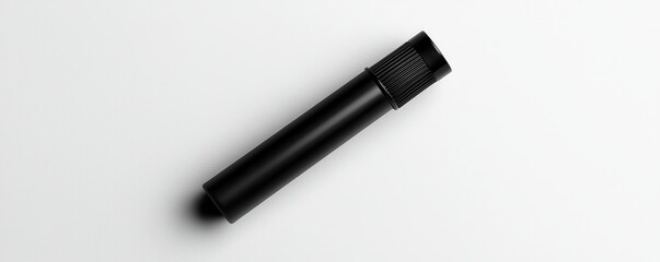 Showcase your beauty product with a matte black tube mockup featuring blank label space for custom design