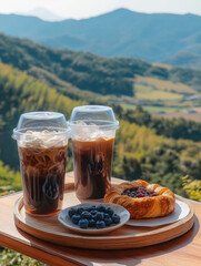 enjoy the mountain view while drinking coffee with croissant