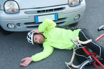 aching man after bicycle accident