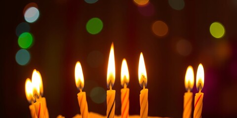 Fototapeta premium Yellow background with a single birthday candle in the center, ready to be lit for a celebration, anniversary, yellow