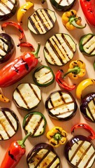 Fototapeta premium Vibrant grilled vegetables including eggplant, bell peppers, and mini peppers, arranged artfully on a wooden surface, showcasing beautiful char marks and colors.