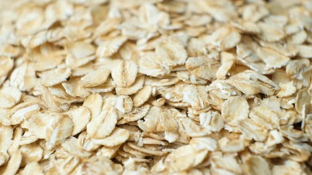 Slow macro rotation of uncooked rolled oats