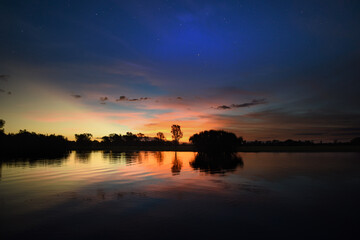 spectacularly and colorful sunset at Yellow Waters Billabong, Kakadu National Park, Northern Territory, Australia
