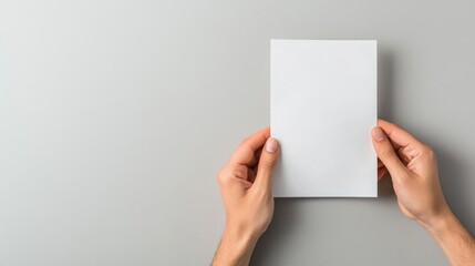 Hands holding data sheet with supplier cost comparison, representing budget optimization