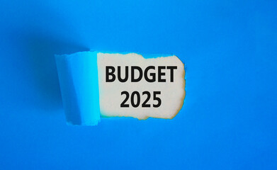 Planning budget 2025 new year symbol. Concept words Budget 2025 on beautiful white paper. Beautiful blue paper background. Business budget 2025 new year concept. Copy space.