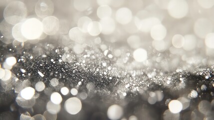 A shimmering background of blurred lights and particles, creating a dreamy, ethereal effect.