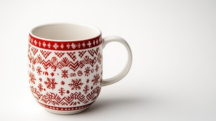 Red and white holiday mug with snowflake patterns
