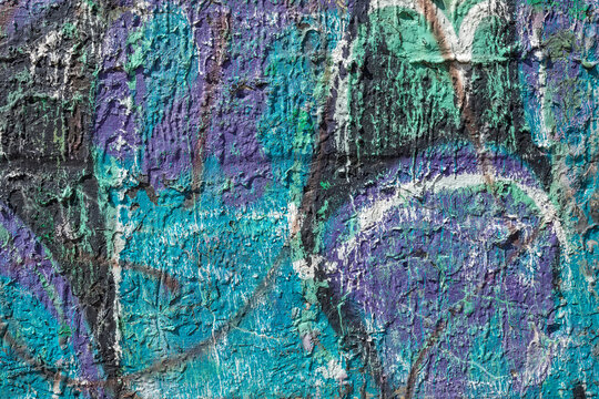 Violet and cian colour dripped paint on old concrete wall background. Natural paintbrush strokes and textured rough cement