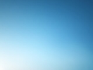 Obraz premium A Clear Blue Sky with a Gradual Gradient to White at the Bottom