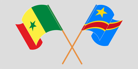 Crossed and waving flags of Senegal and Democratic Republic of the Congo. Vector illustration