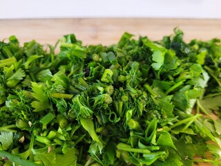 Chopped parsley leaves and dill.