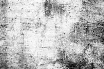 Close-up of a weathered concrete wall texture in grunge black and white tones.