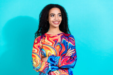 Fototapeta premium Photo of pretty young girl crossed arms look empty space wear pullover isolated on teal color background