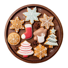 A plate of assorted cookies with a Christmas tree and a red stocking. The cookies are decorated with icing and sprinkles