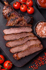 Grilled wagyu beef tomahawk steak with salt, spices and herbs