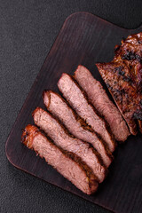 Grilled wagyu beef tomahawk steak with salt, spices and herbs