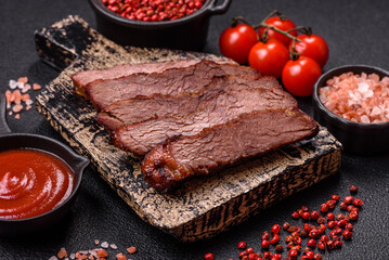 Grilled wagyu beef tomahawk steak with salt, spices and herbs