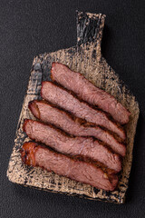 Grilled wagyu beef tomahawk steak with salt, spices and herbs