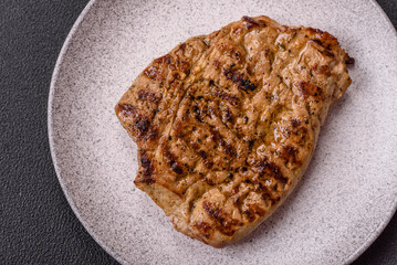 Grilled beef or pork steak with salt, spices and herbs