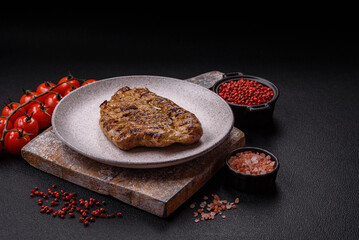 Grilled beef or pork steak with salt, spices and herbs