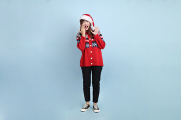 Woman wearing Santa hat