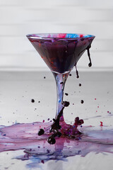 Glass with painted water up and splash