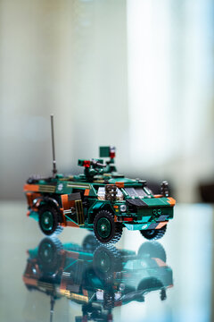 plastic toy model of modern German light armored vehicle Fennek of Bundeswehr military force, building block construction set machine