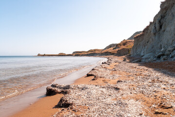 Beautiful view of a red sand beach on a Greek island