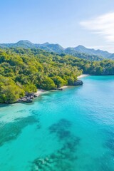 Stunning tropical beach with turquoise waters and lush green mountains