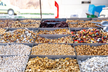 Meticulously Arranged Nuts and Dried Fruits on Market Stall