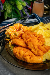 Pieces of chicken fried in breadcrumbs.