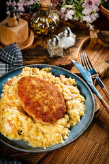 Minced meat cutlet with boiled sauerkraut.