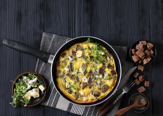 omelette with blue cheese, rye croutons and thyme