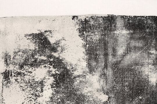 Black and beige art Abstract grunge ink painting texture grain dot blot Monotype dirty stain on fabric background.