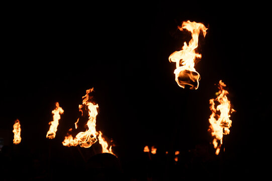 Lewes, East Sussex, UK. 05 November 2024. Burning torches as bonfire societies parade through Lewes, a tradition that commerates the burning of 17 martyrs during Queen Mary I reign in the 1550s