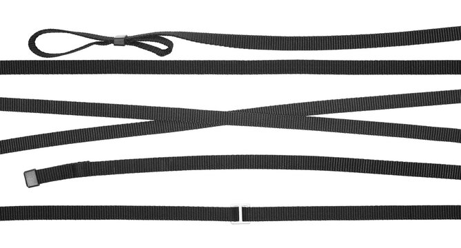 Set black synthetic nylon fastening belt, strap isolated on white, clipping
