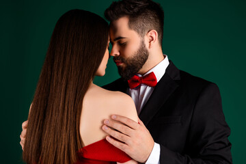 Photo portrait of classy lovely young lady gentleman couple getlen touch hug dressed stylish fancy garment isolated on green background